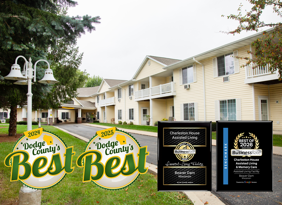 Charleston House photo with three badges